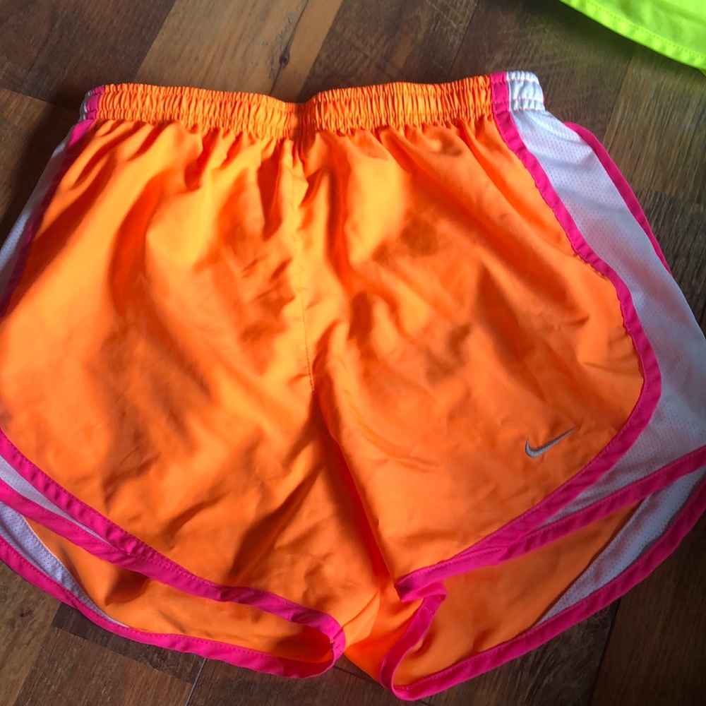 orange nike shorts